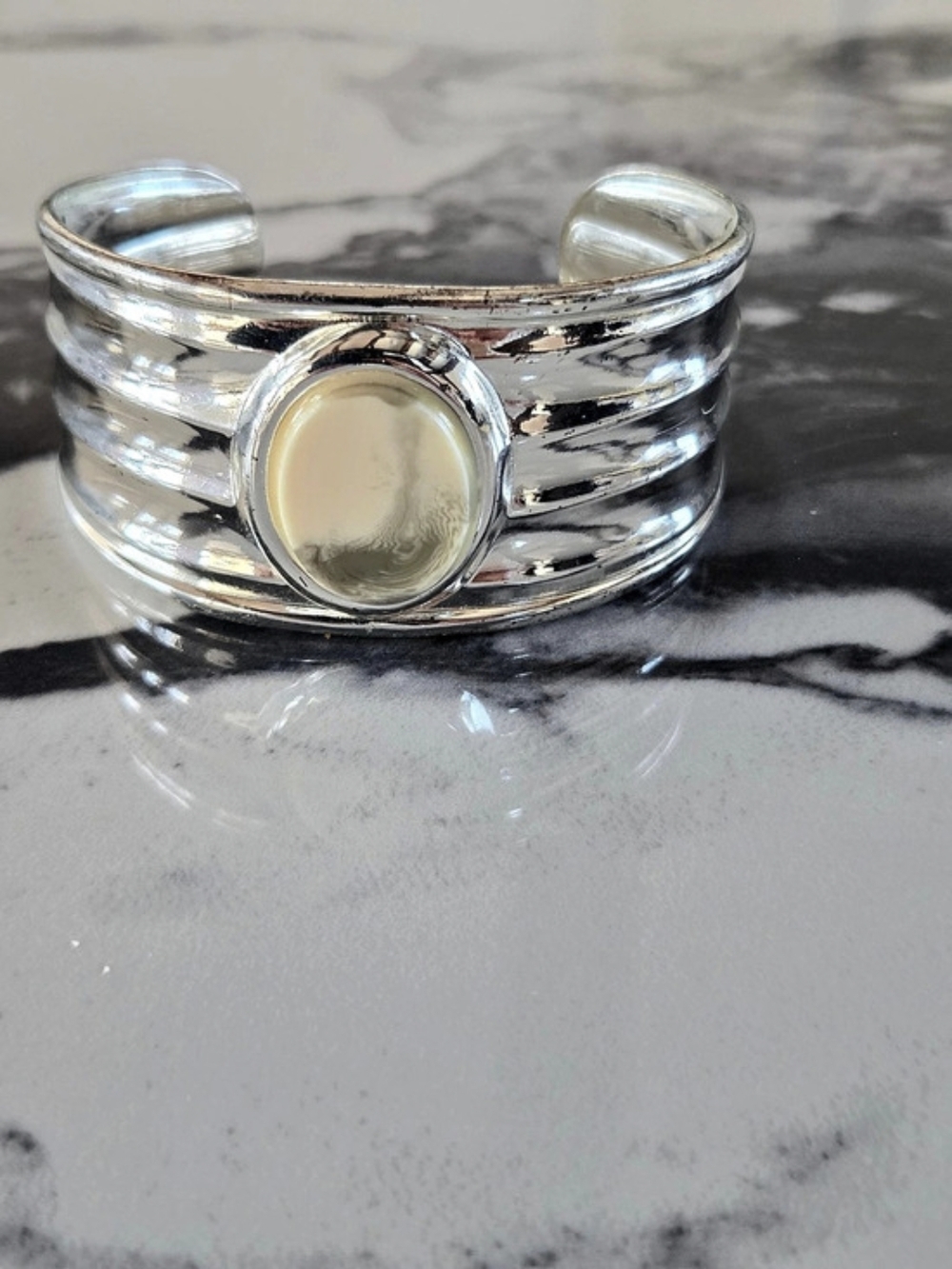 Vintage Silver-Tone Ribbed Cuff Bracelet with Ivory Cabochon Centerpiece